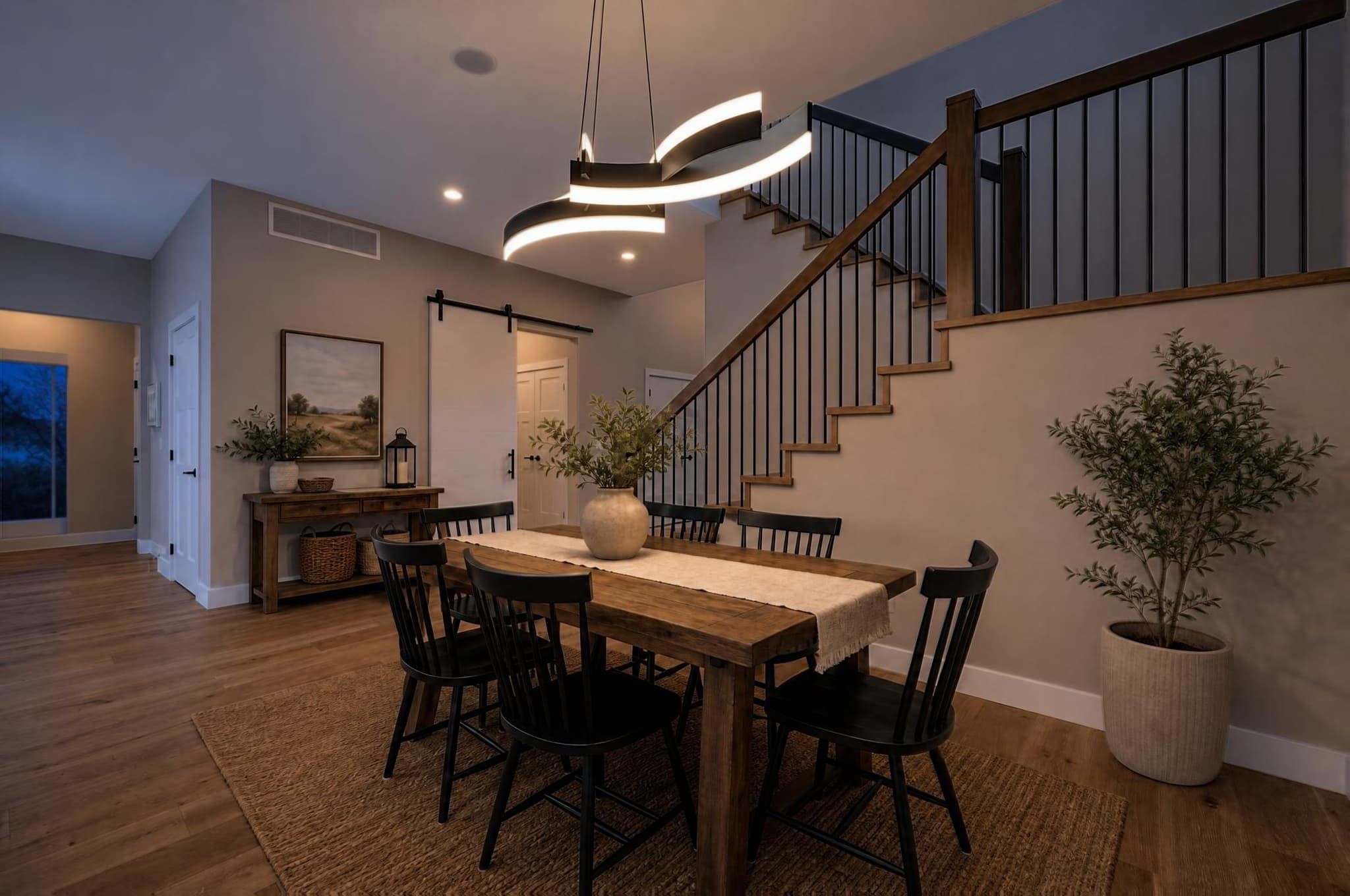 The same dining room relit in Indigo Hour