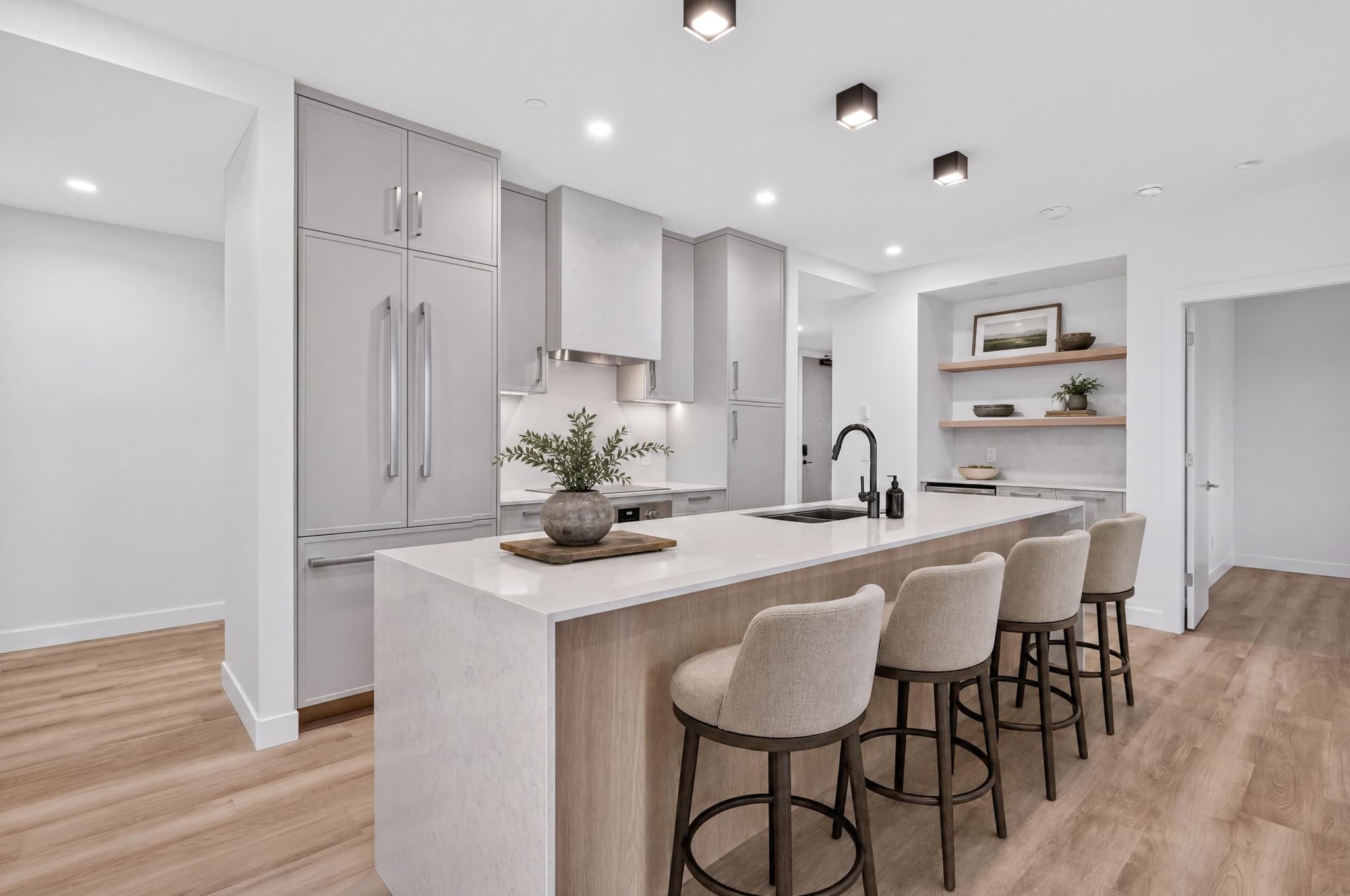 Bright furnished kitchen before lighting-focused editing