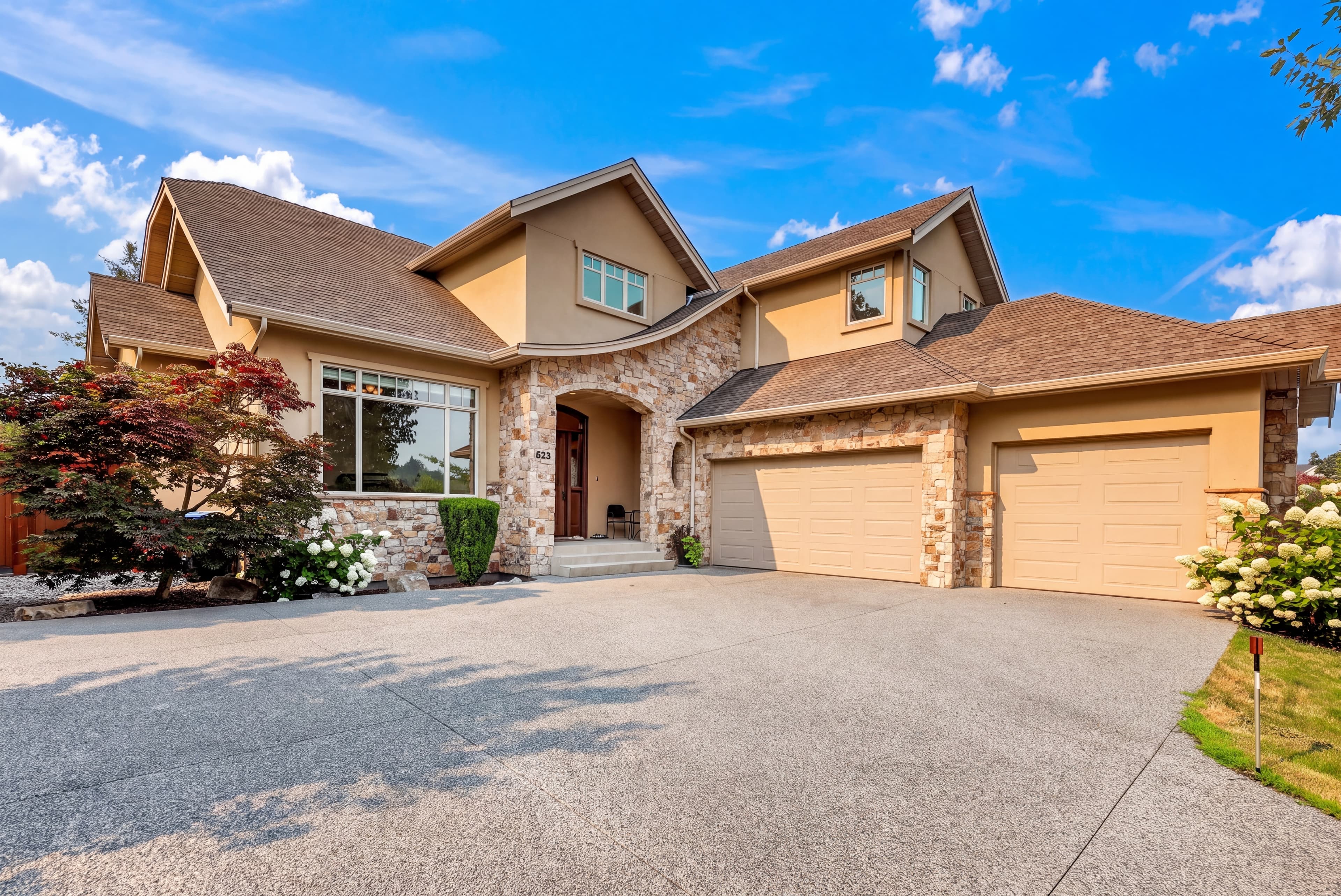 Daylight source of a detached stone and stucco house