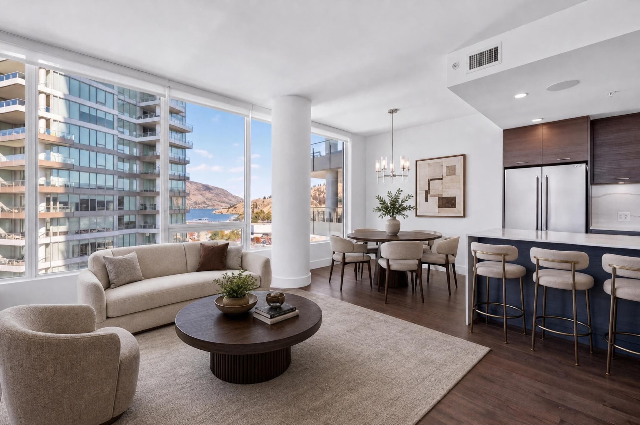 Furnished open living and dining room with broad windows used as an editorial complexity example